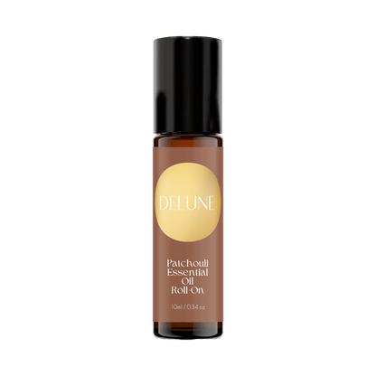 Patchouli Essential Oil Roll-On, 10ml bottle, offers grounding, earthy aroma with fractionated coconut oil for creativity and balance.