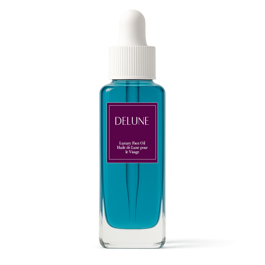 Delune Plum & Blue Tansy Luxury Face Oil bottle with dropper lid, rich in antioxidants and Omegas, promoting radiant, even skin.