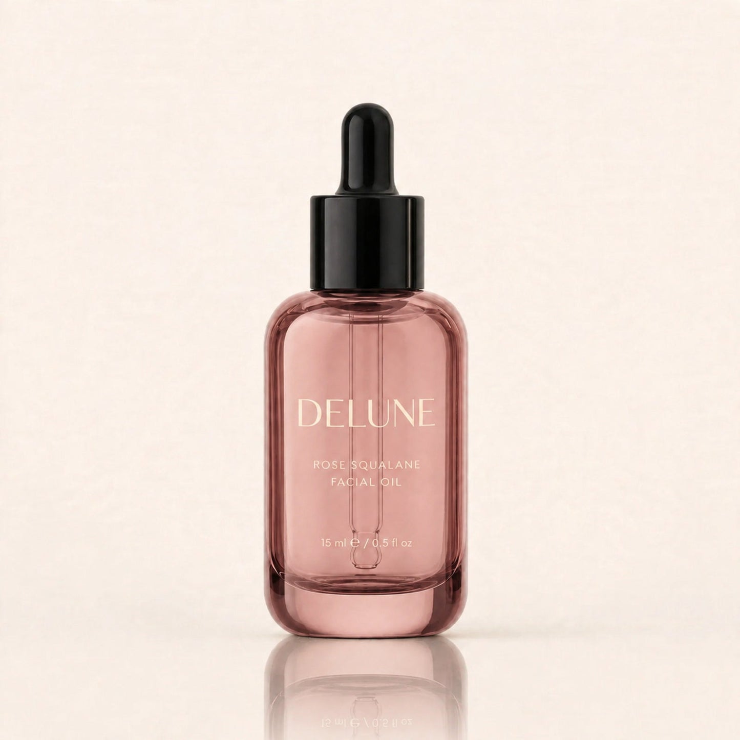Delune Rose Squalane Facial Oil 15ml in blush glass bottle