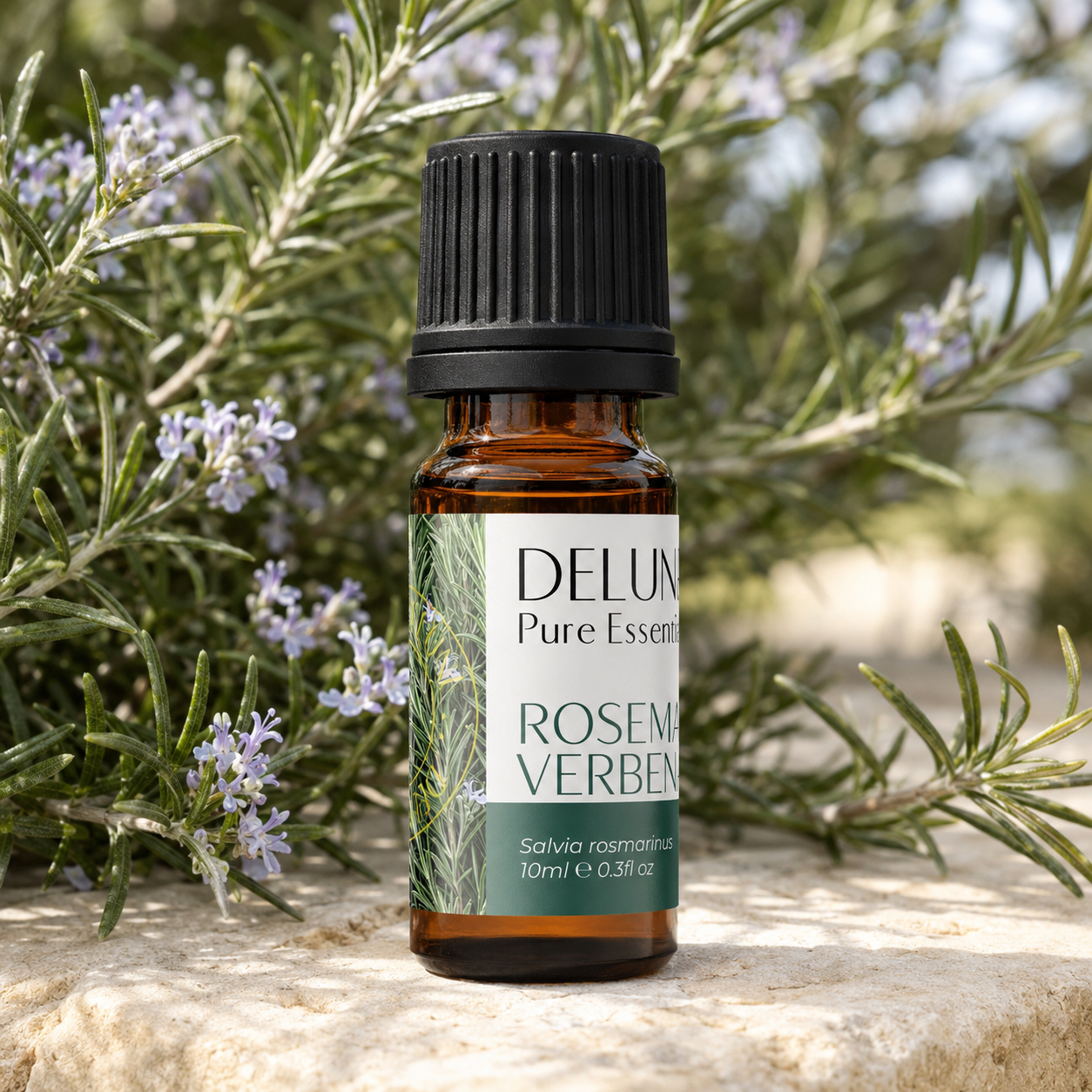 Rosemary Verbenone Pure Essential Oil with rosemary foliage and pale flowers