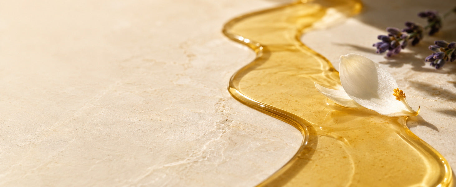 Editorial Floral Squalane golden oil texture with restrained botanicals